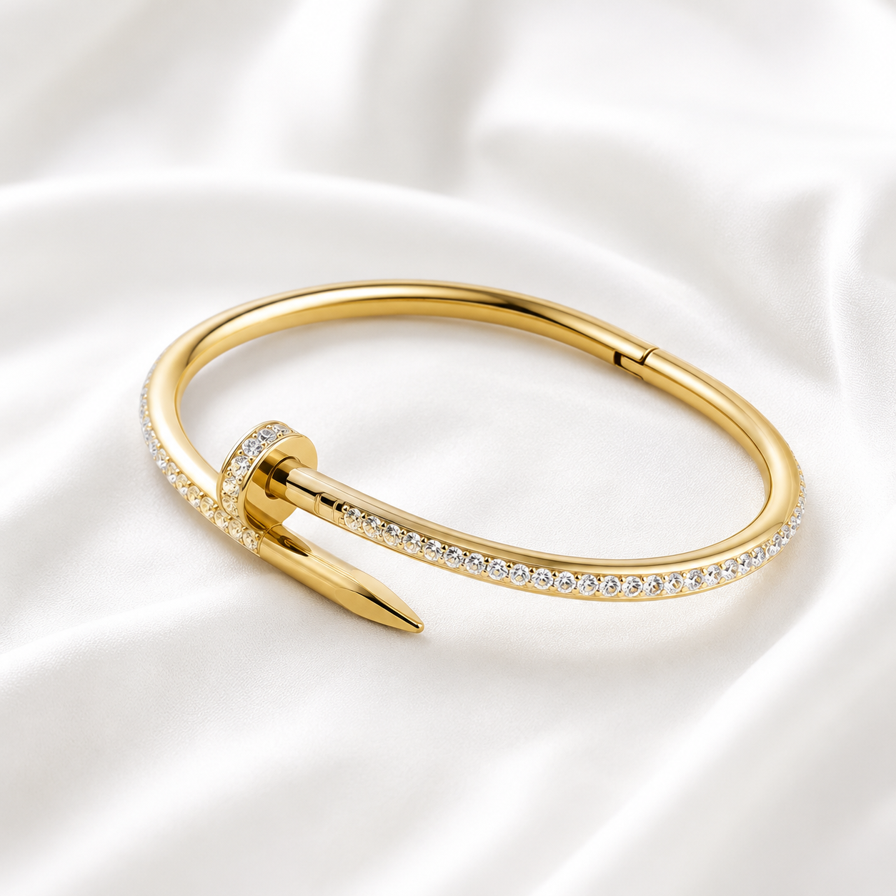 Gold crystal nail bangle with elegant modern design by ZenviraLuxe.