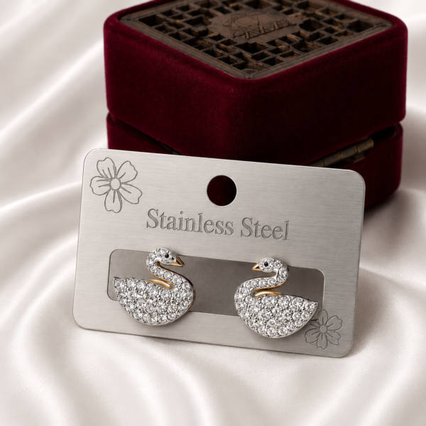 Crystal swan stainless steel ear studs with sparkling zircon stones in an elegant design.