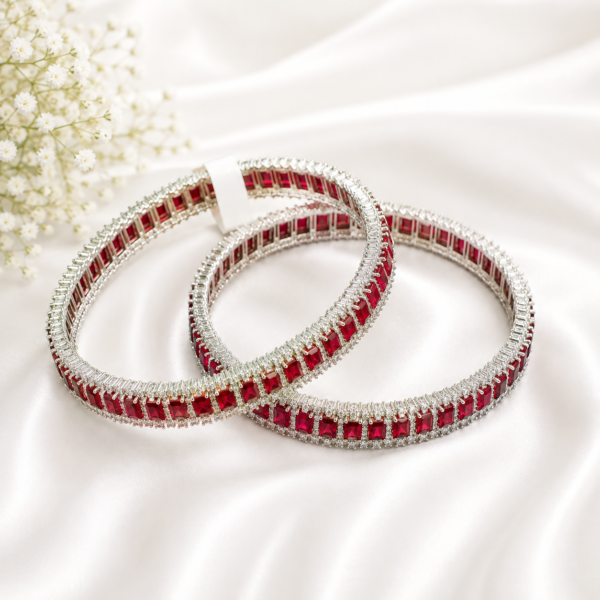 1 (4) ZL 01550020000 Premium Ruby Red Zircon Bangle Set for Women featuring rich red stones, sparkling zircon detailing and an elegant silver-tone finish. Perfect for weddings, parties and festive occasions.